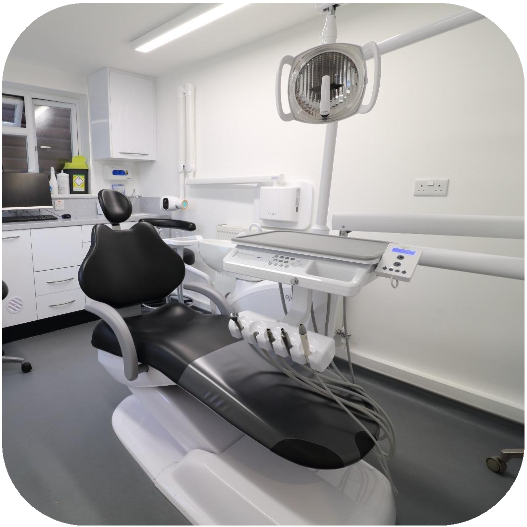 Ajax dental chair with black upholstery installed in a dental practice