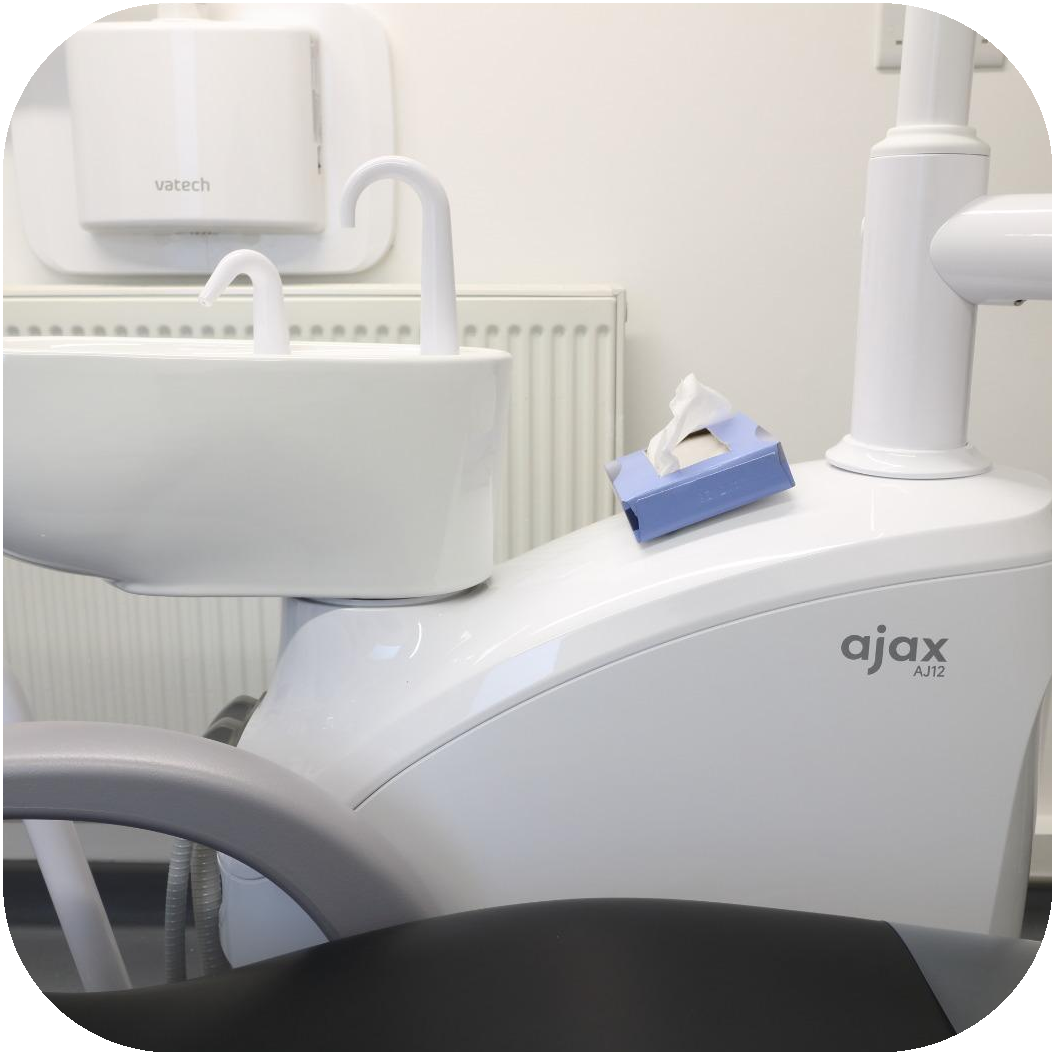 Side view of the Ajax dental chair spittoon and sink