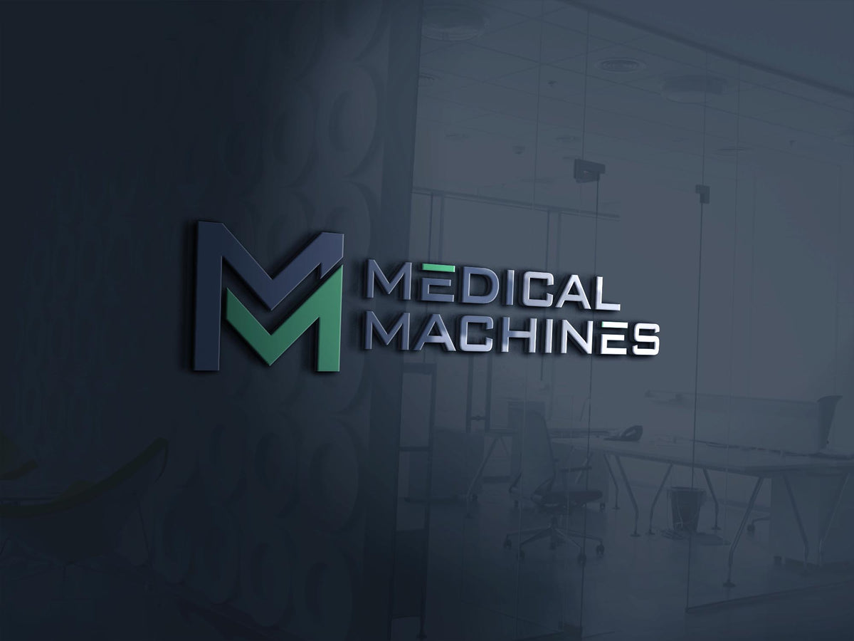 A 3D logo for 'MEDICAL MACHINES' featuring a stylized metallic 'M' with a green accent and silver text, displayed on a dark glass wall with a blurred office background.